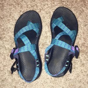 Blue and purple Chacos